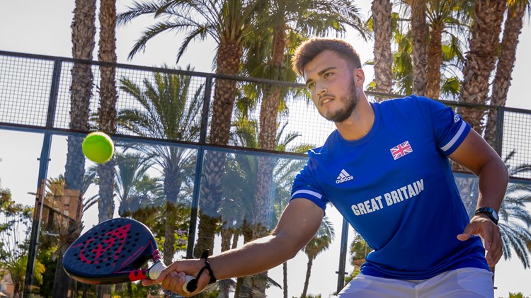 Louie Harris in action fo Great Britain hitting a volley