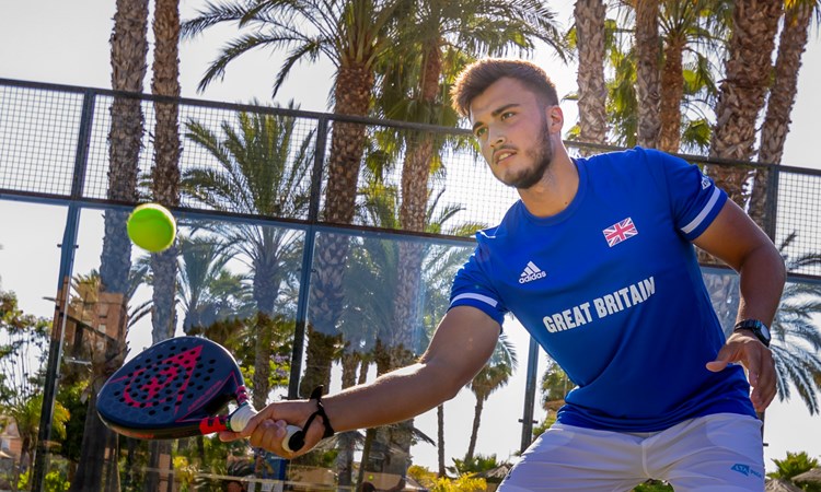 Louie Harris in action fo Great Britain hitting a volley