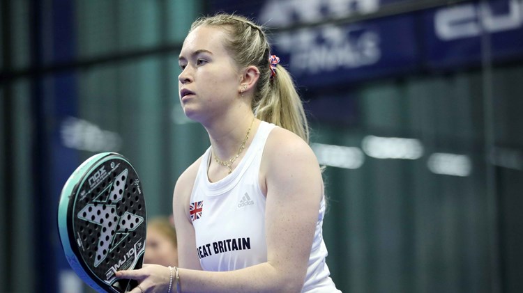 Tia Norton representing Great Britain at the European Padel Championships on court, ready to play a point
