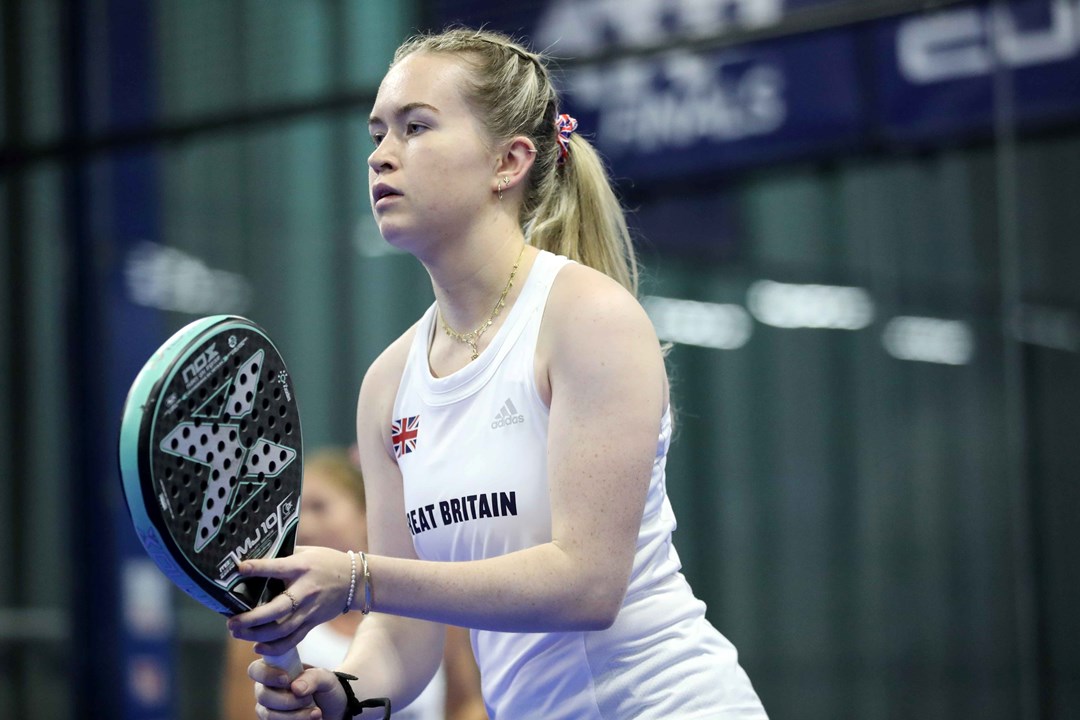 Tia Norton representing Great Britain at the European Padel Championships on court, ready to play a point