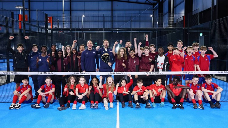 Jason Manford with a group of secondary school kids at an event at Pure Padel, Manchester