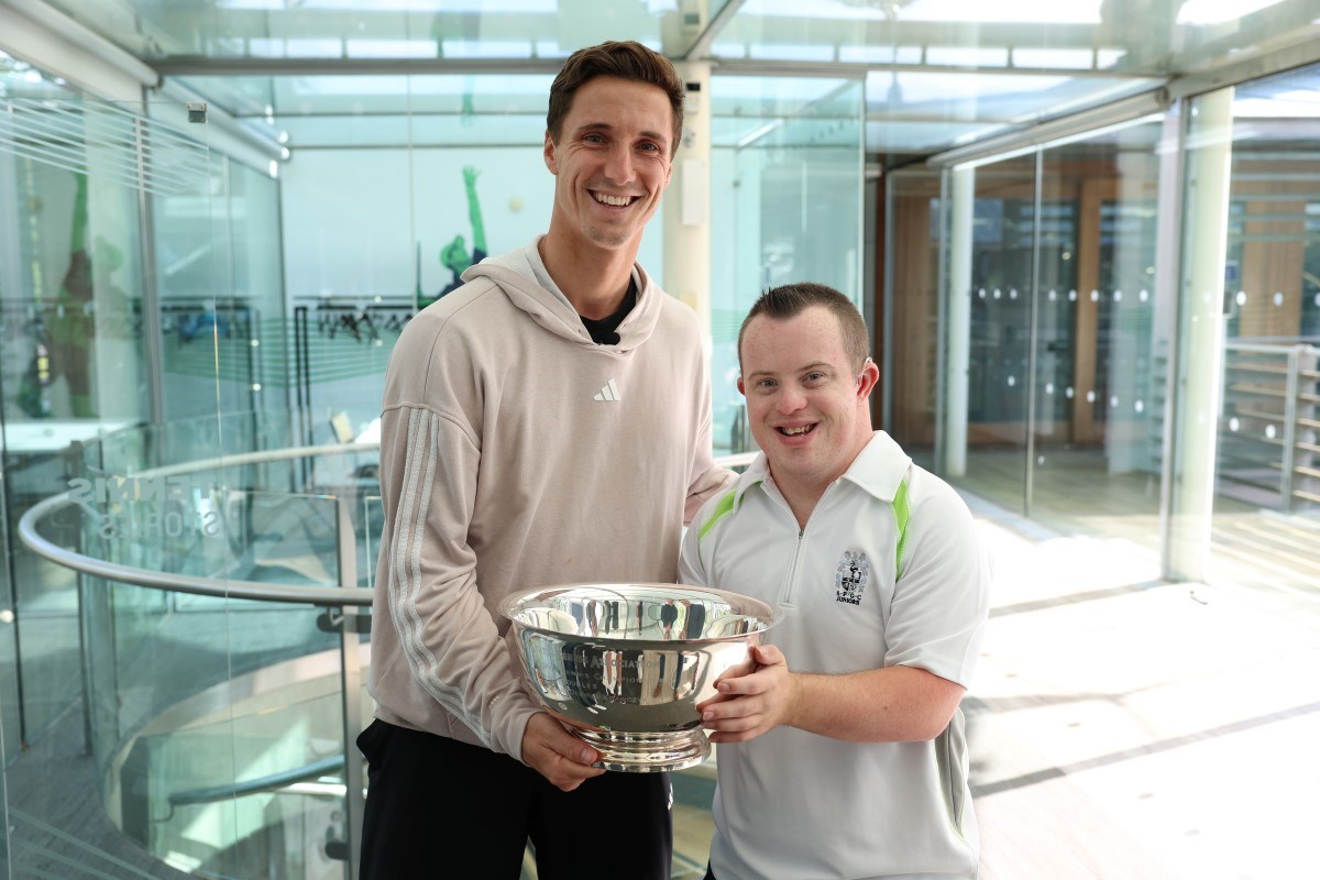 James holding a trophy with Joe Salisbury