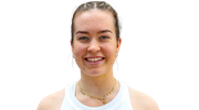 A front-on headshot of British padel player Tia Norton smiling
