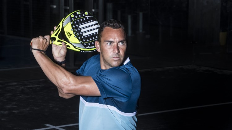 Padel player Richard Brooks lines up a backhand