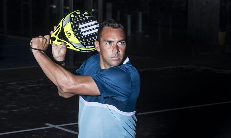 Padel player Richard Brooks lines up a backhand