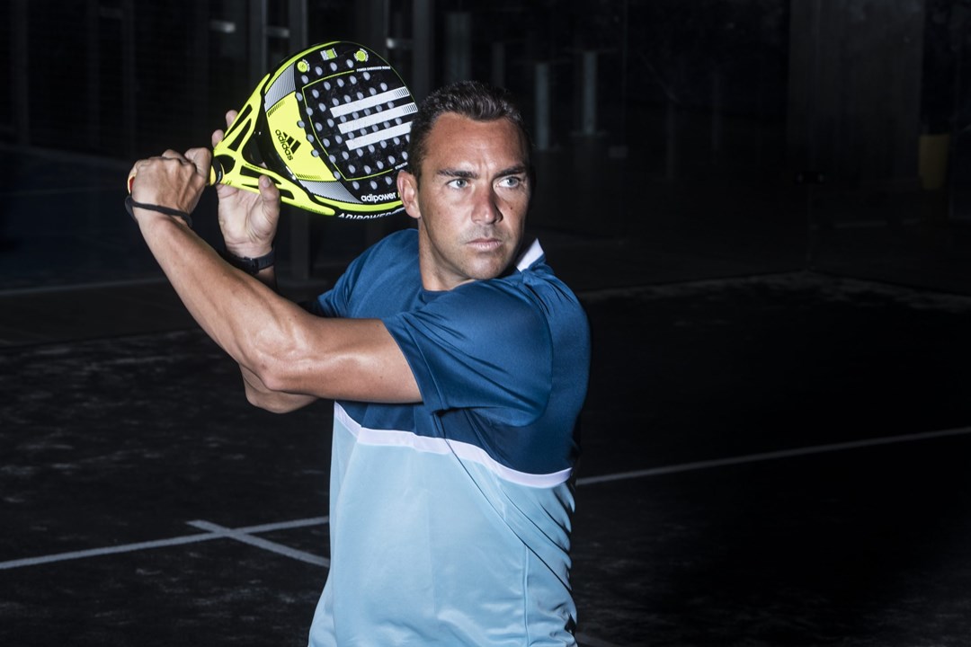 Padel player Richard Brooks lines up a backhand