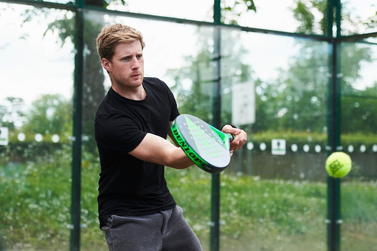 man-hitting-padel-shot.jpg