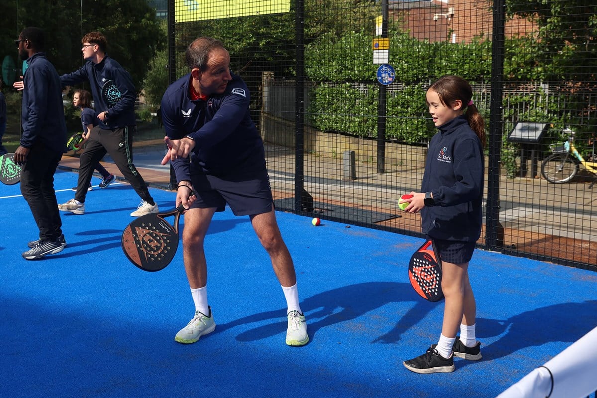 young-girl-with-padel-coach.jpg