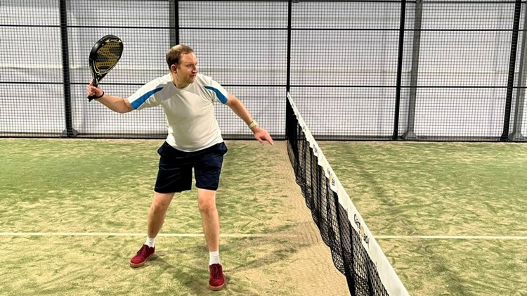 Jonathan MacBride preparing to return the ball