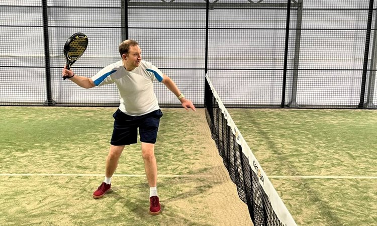 Jonathan MacBride preparing to return the ball