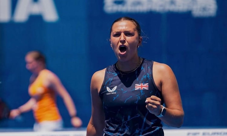 Catherine Rose cheering and pumping her fist in celebration on court
