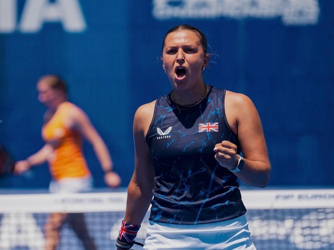 Catherine Rose cheering and pumping her fist in celebration on court
