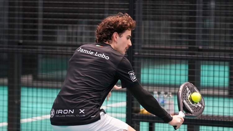 GB padel star Jamie Lobo hitting a backhand