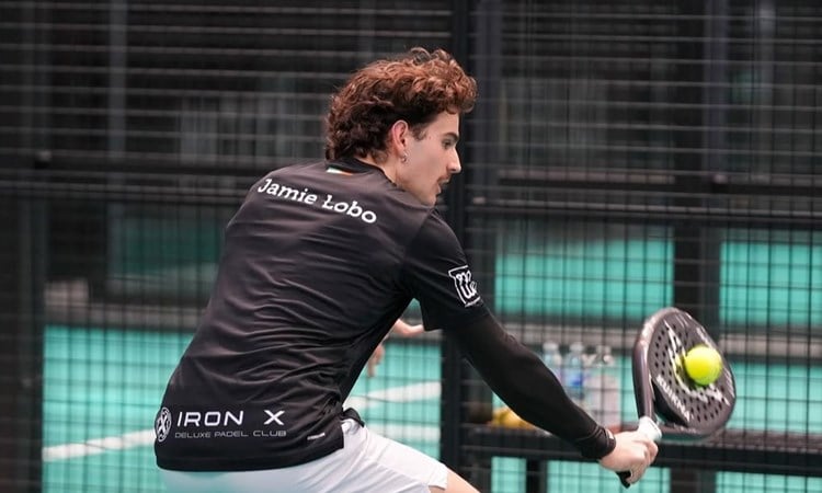 GB padel star Jamie Lobo hitting a backhand