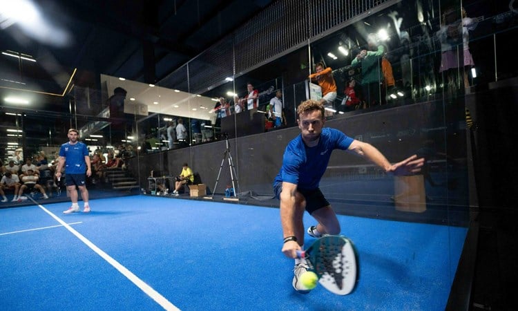 GB men's team in action hitting a backhand at the FIP Euro Padel Cup