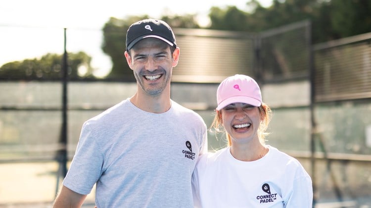 Connect Padel UK Founder, Charlie Thomson and Golden Globe-nominated actress Lily James (Charlie's sister) smiling together on a padel court