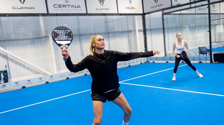 Former Lioness football player Steph Houghton preparing to hit a shot on court at the Pro Am Padel Tour event at Pure Padel Stockport