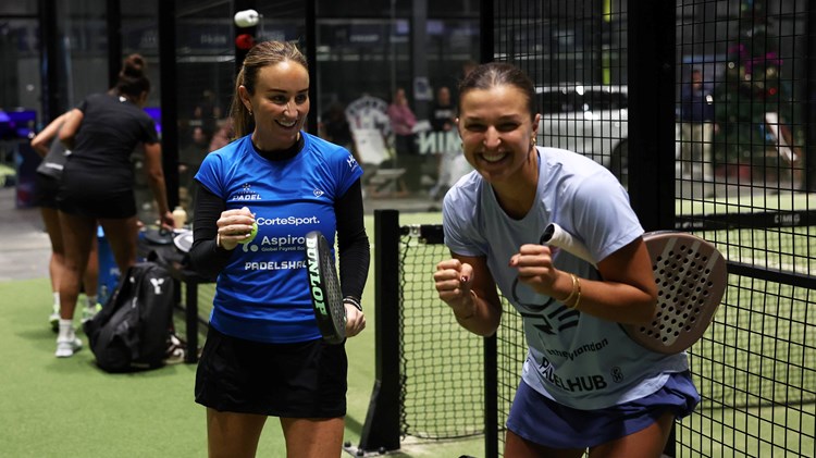 Aimee Gibson and Catherine Rose celebrate off court after a win at the LTA Padel National Championships