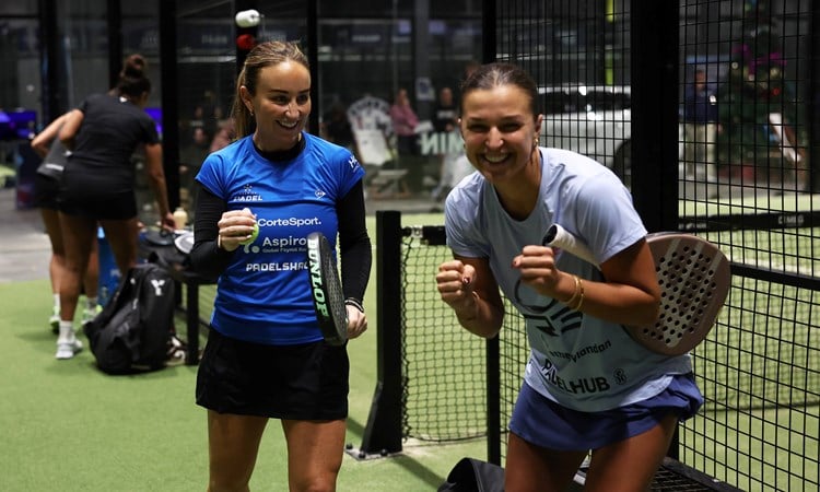 Aimee Gibson and Catherine Rose celebrate off court after a win at the LTA Padel National Championships