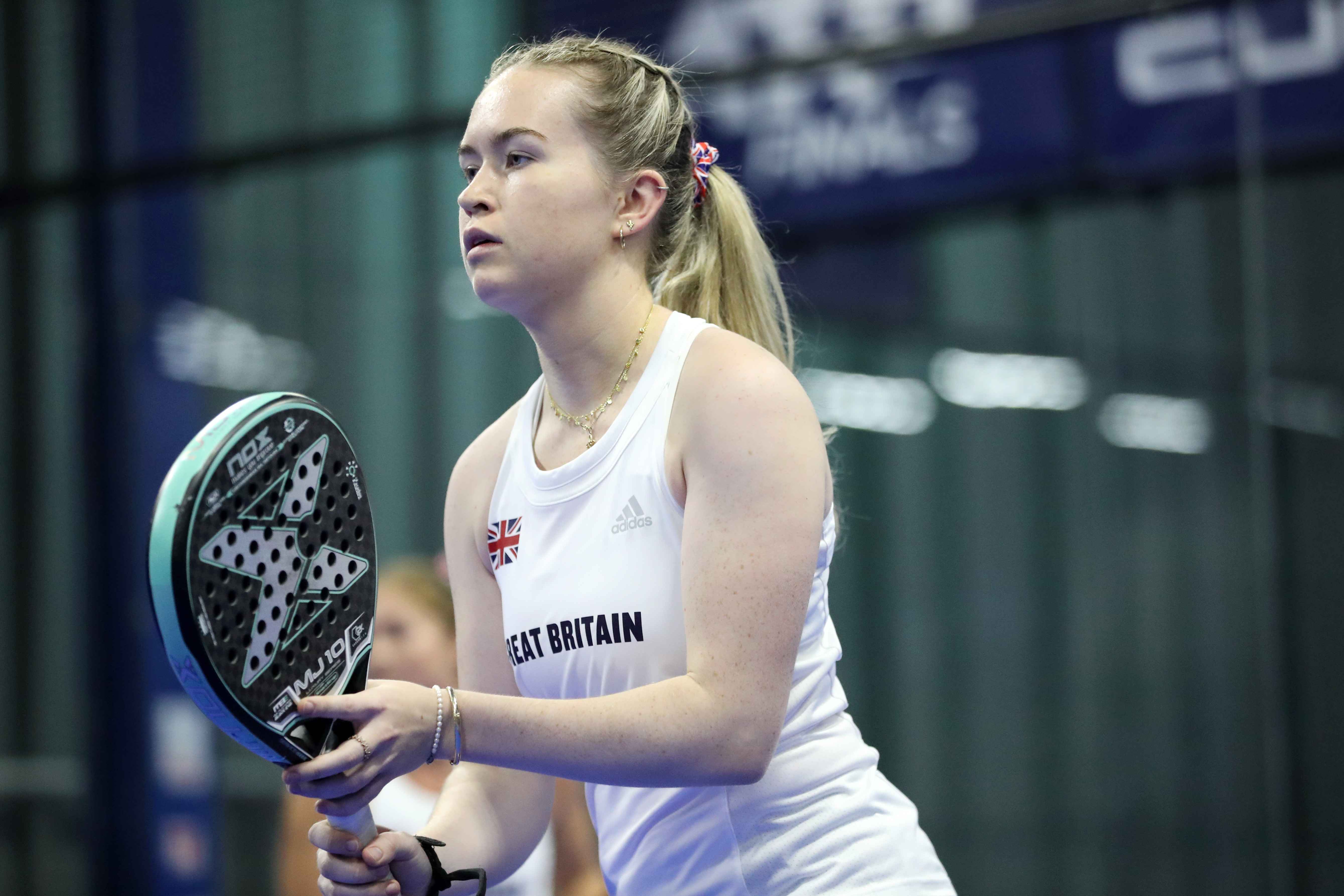 Tia Norton representing Great Britain at the European Padel Championships on court, ready to play a point