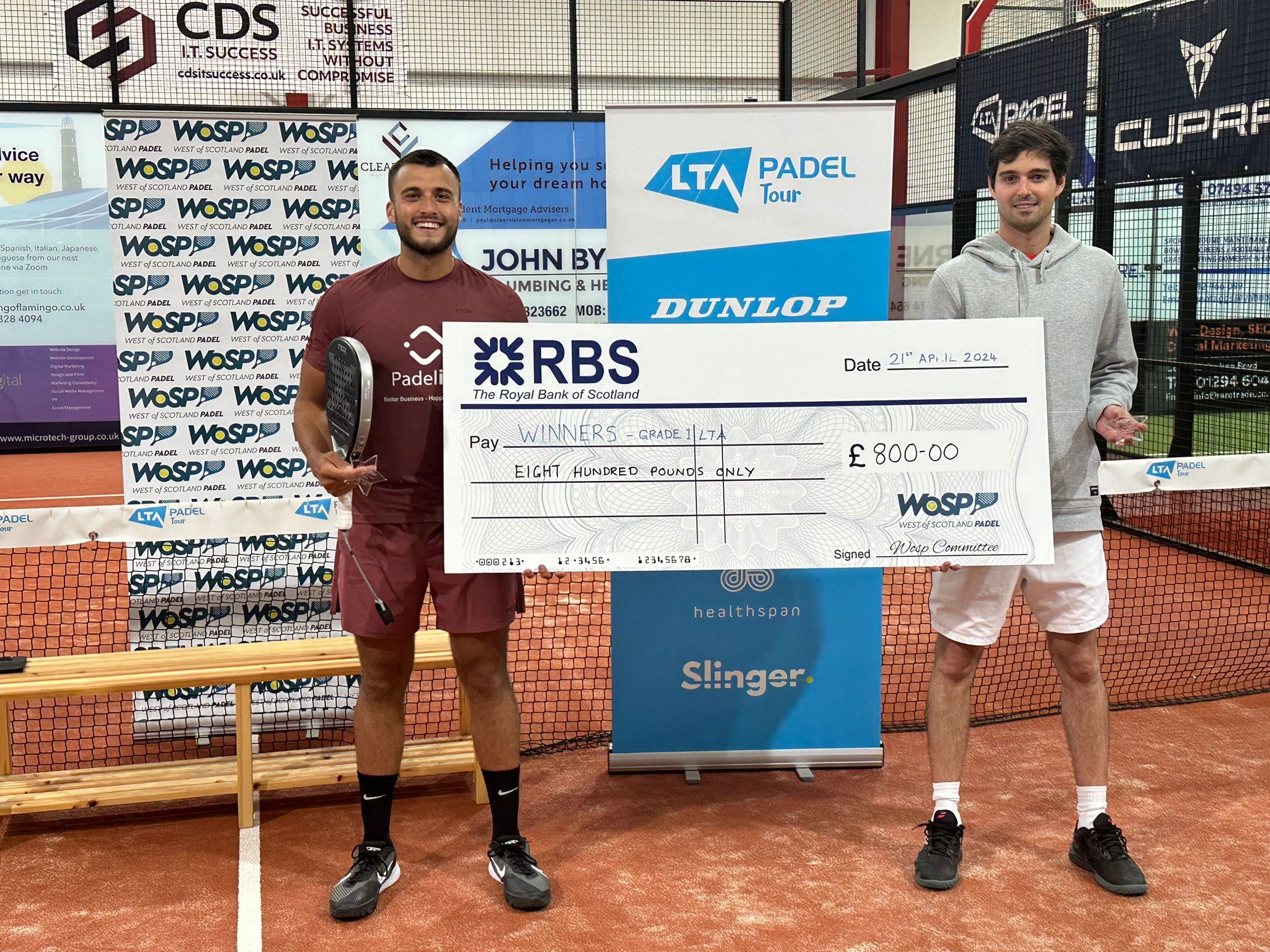 Brits Louie Harris & Karen Crawford pose with trophies at LTA Padel British Tour in Stevenson