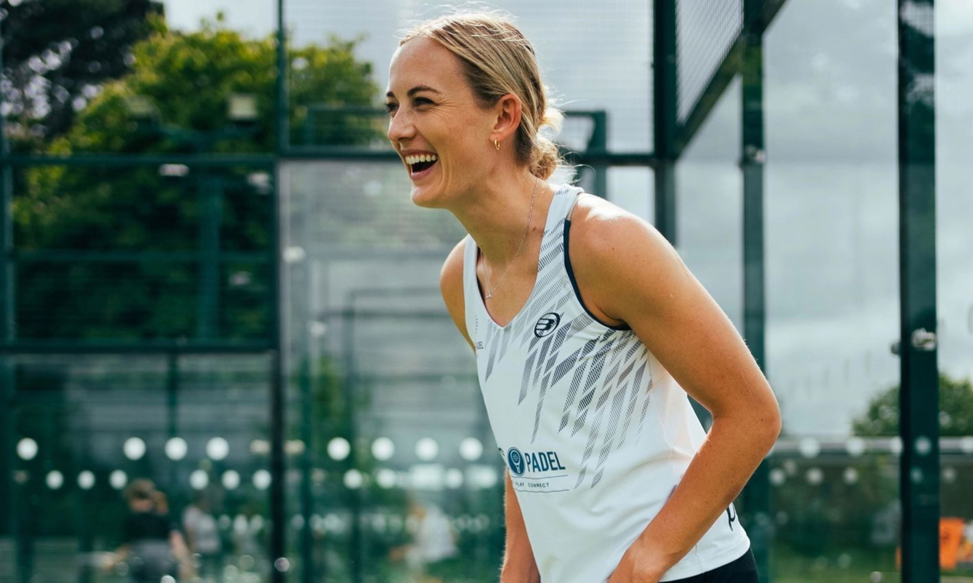 Victoria Nicholas laughing on court