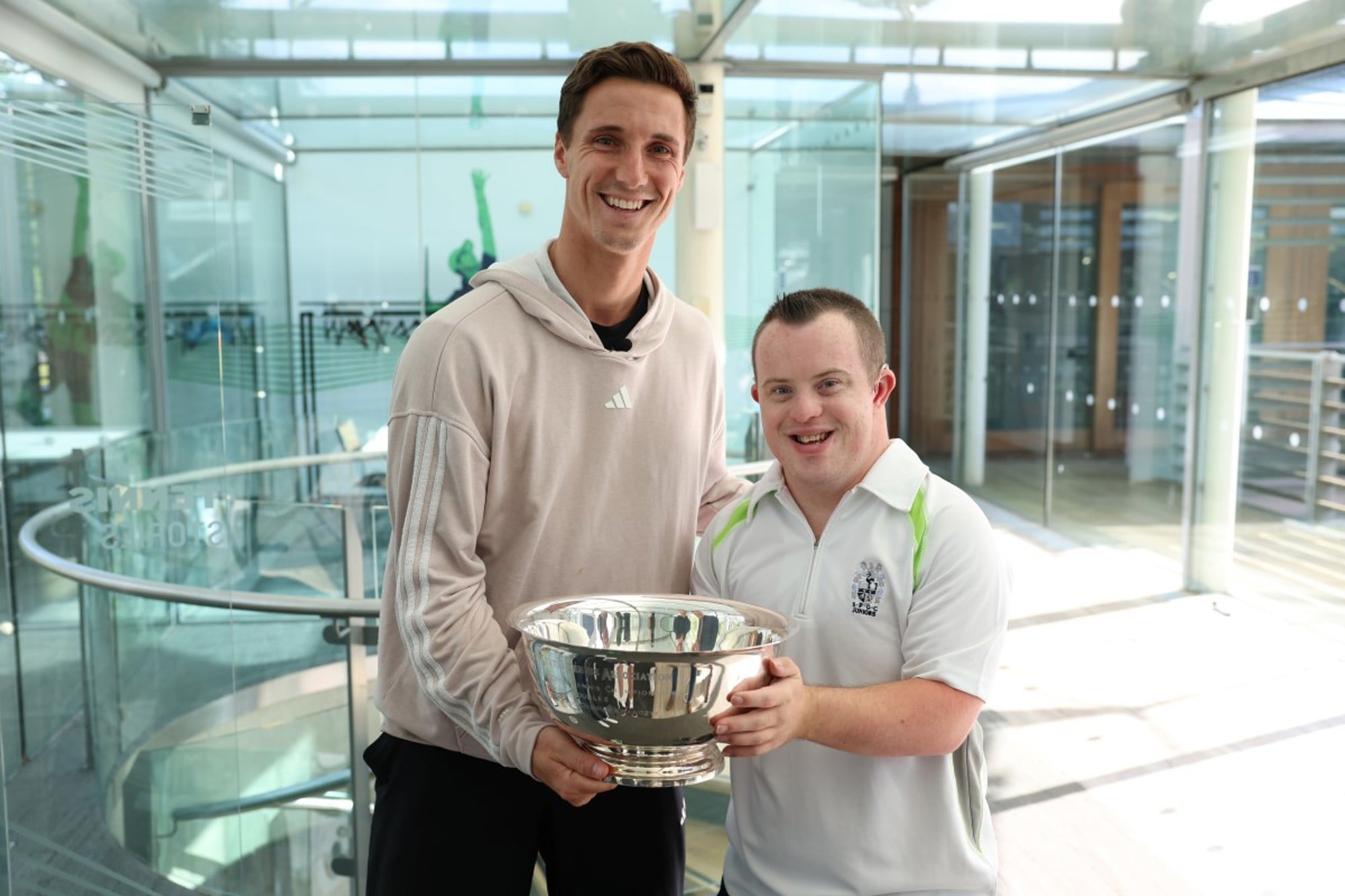 James holding a trophy with Joe Salisbury